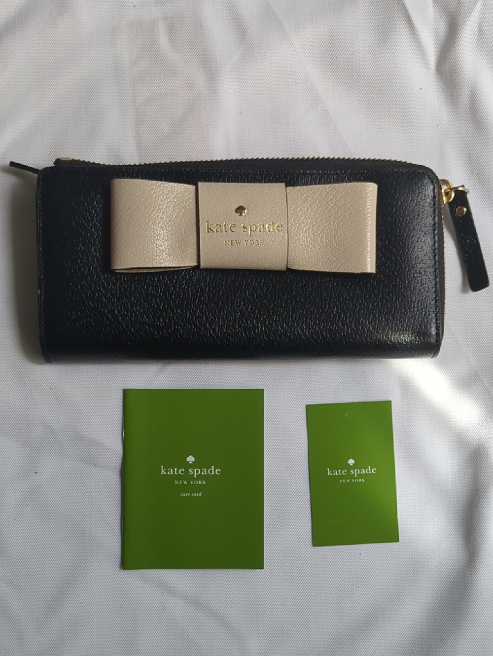 kate spade Black Leather Zip Wallet with Cream Bow Accent
